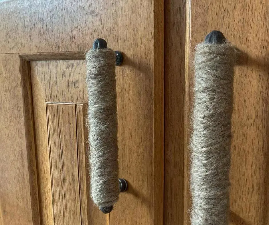Twine covered kitchen cabinets handles.
