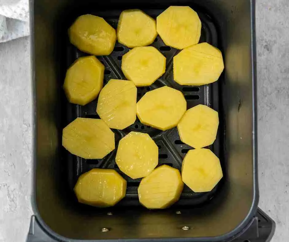 Air fryer potatoes in the air fryer.