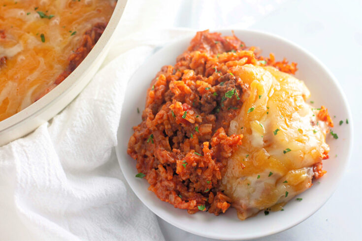 Taco rice dish in a white bowl.