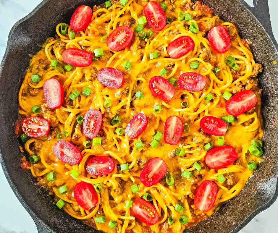 Taco spaghetti cooked in skillet.